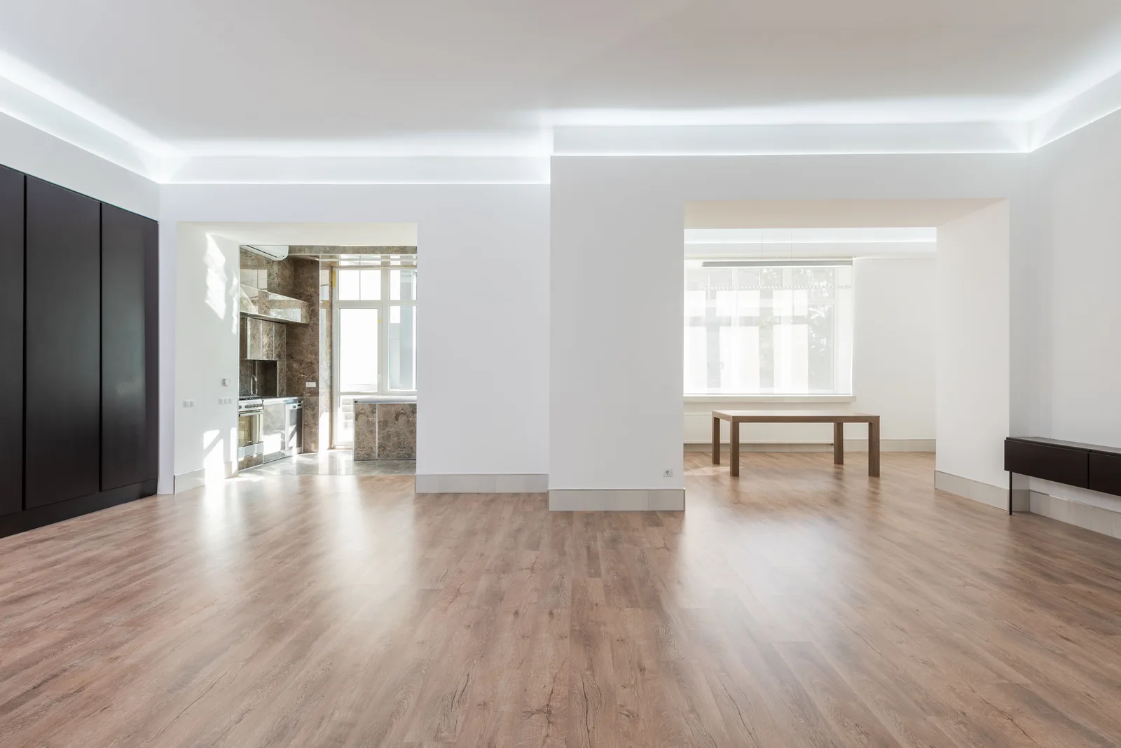 Engineered wide-plank wood floor in a modern room